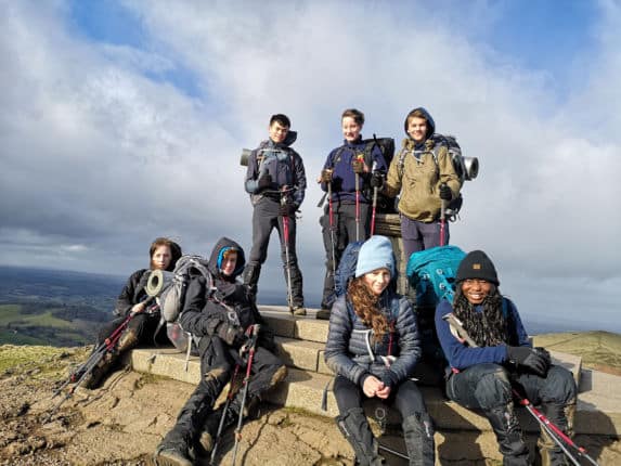 Boarding school pupils on hiking expedition