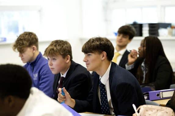 Boys in classroom paying attention