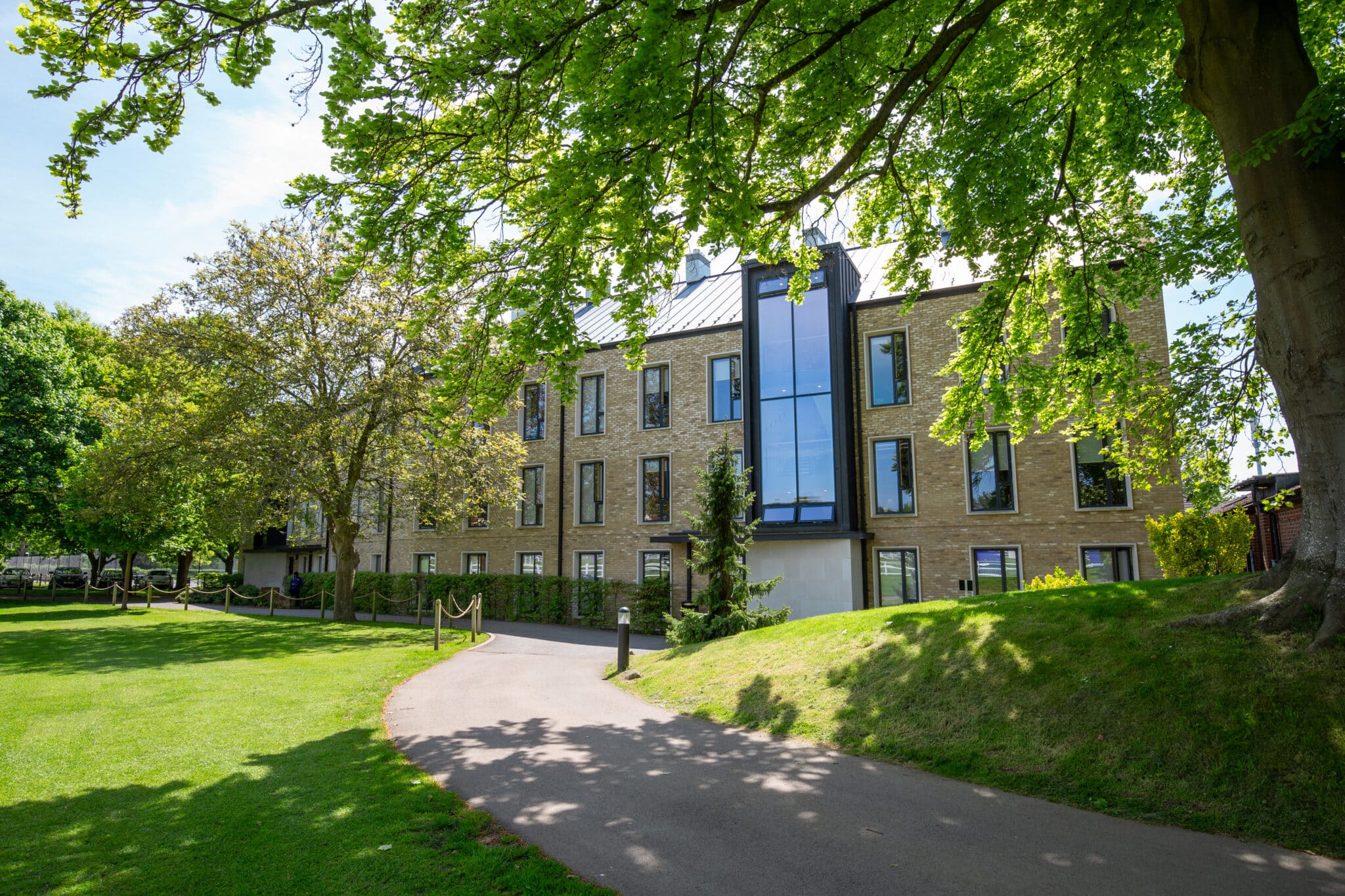 School building exterior with trees