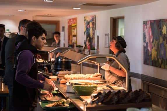 Senior school pupils being served at canteen