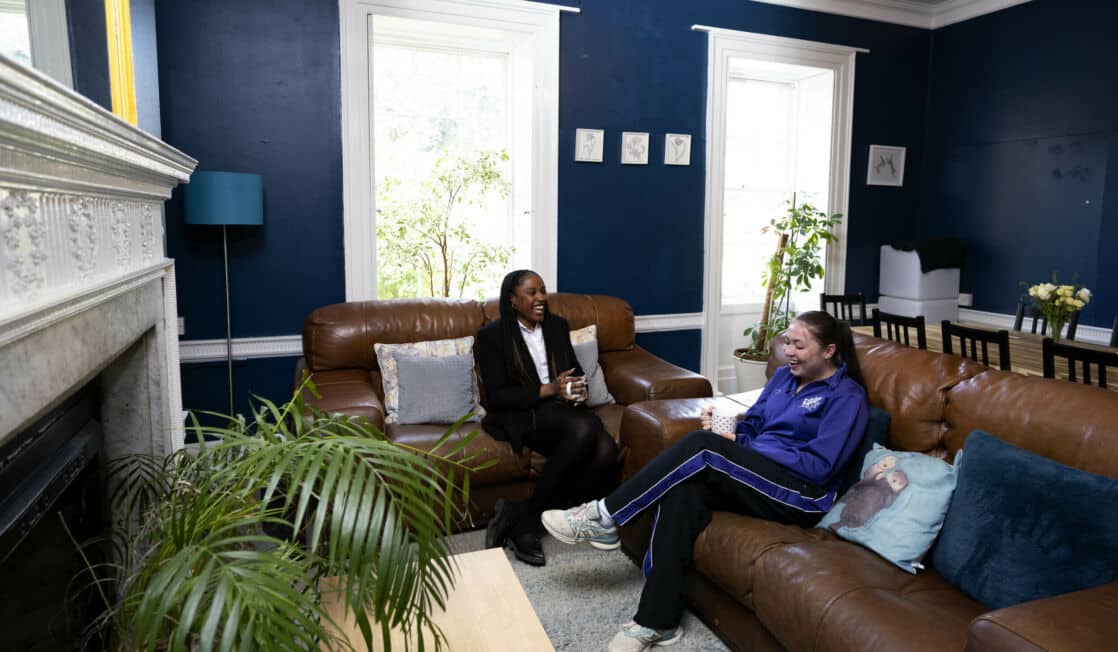 Boarding school living room with girl pupils