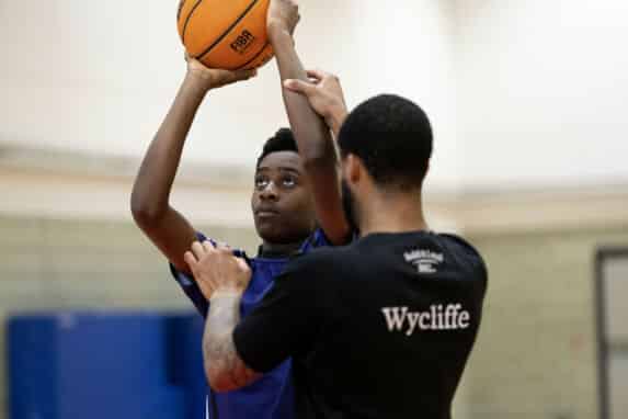 Senior school boys playing basketball