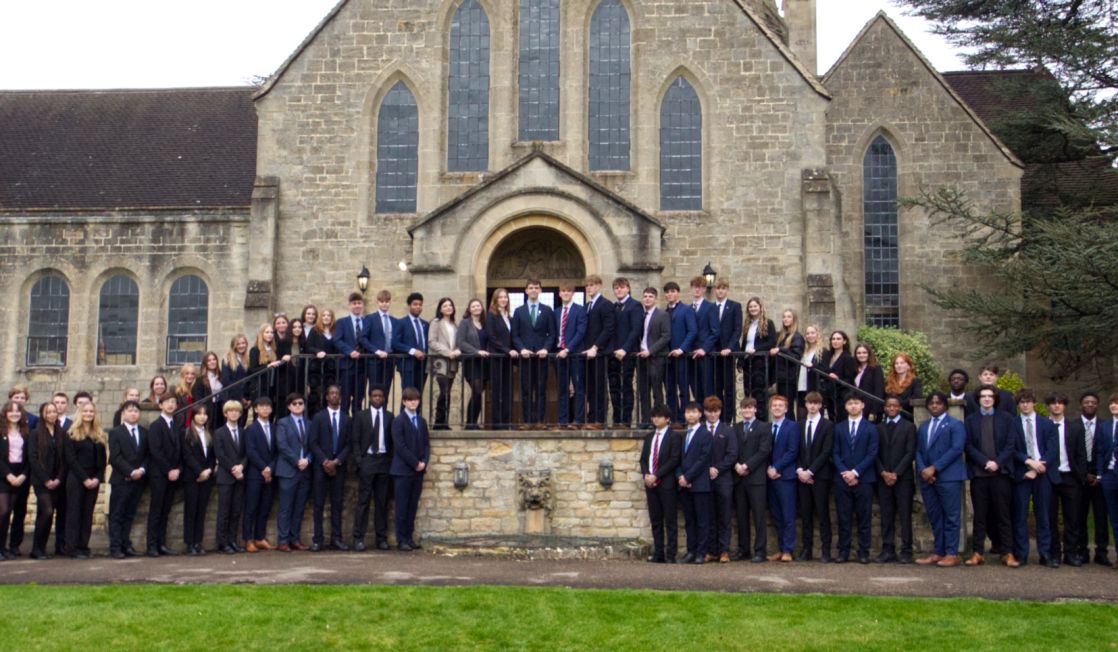 Group of senior school pupils outside of chapel