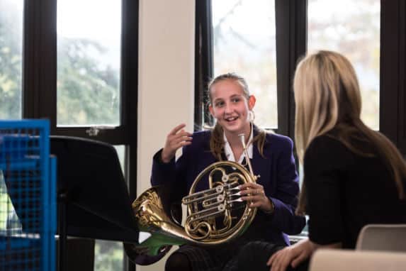 Senior School girl with brass instrument