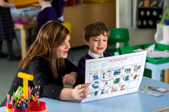 pre prep boy learning with teacher