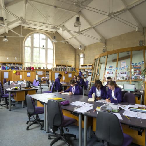 Group of school girls at desk